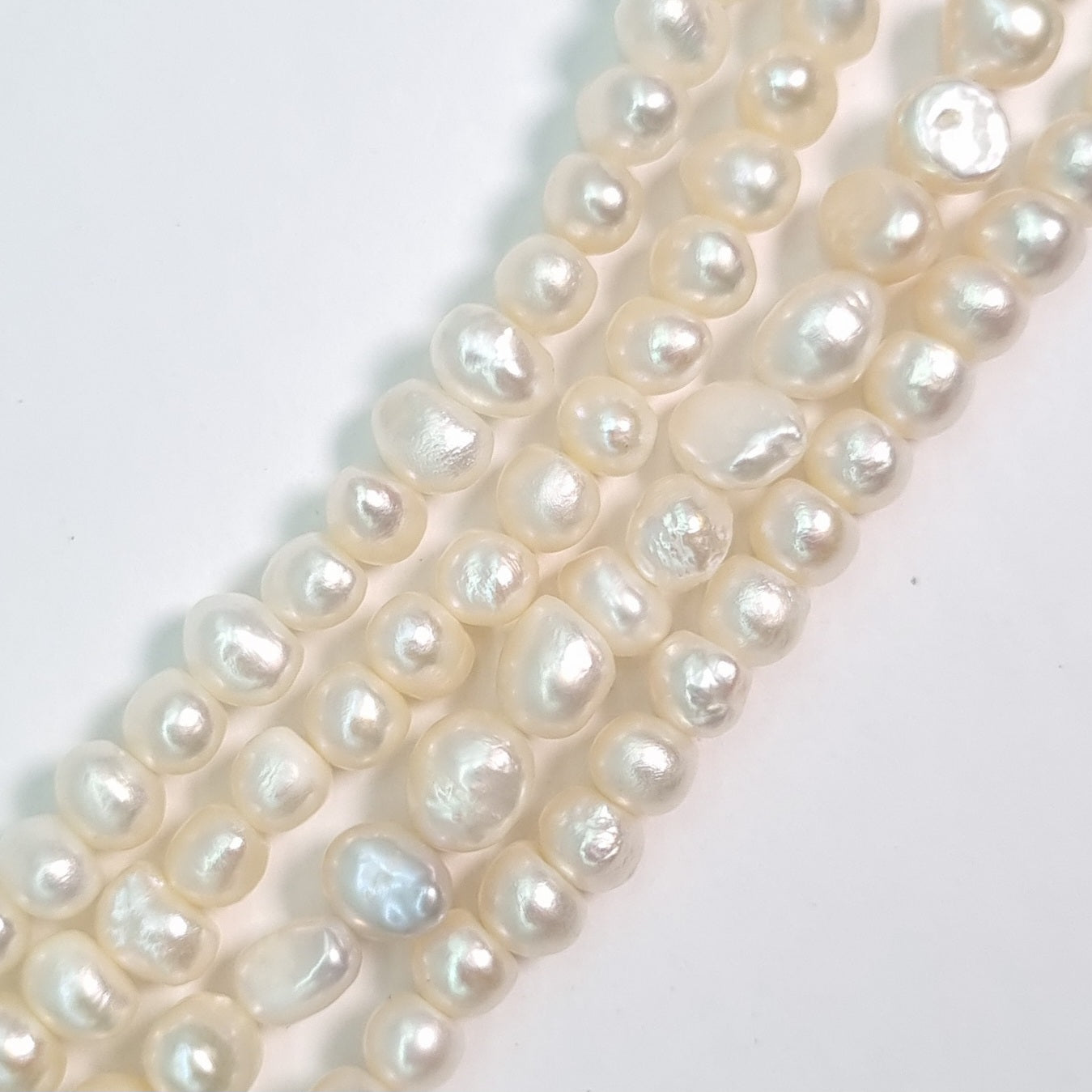 Perla Cultivada de 4-6 mm. por tira O2505