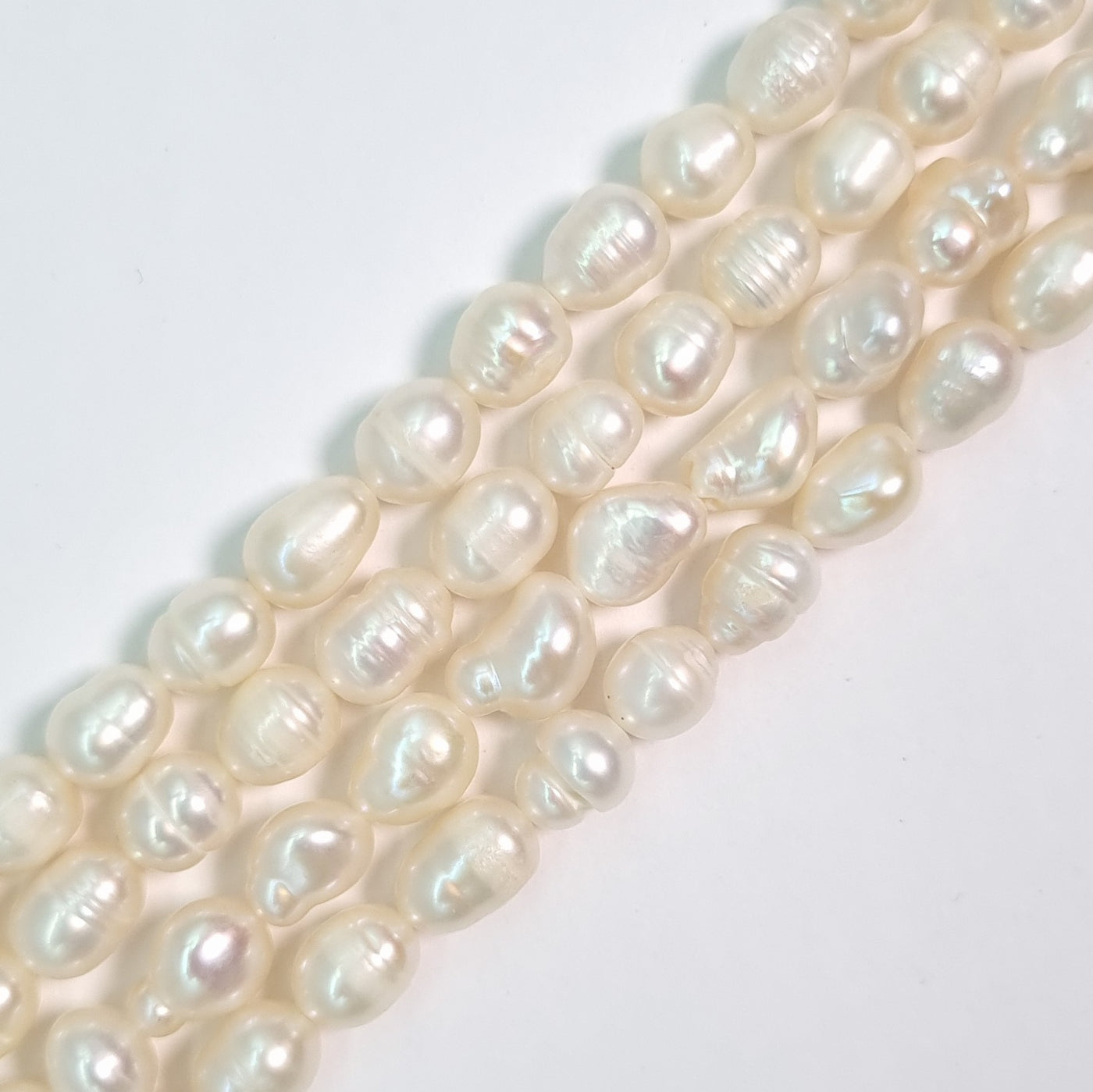 Perla Cultivada de 4-6 mm. por tira O2507