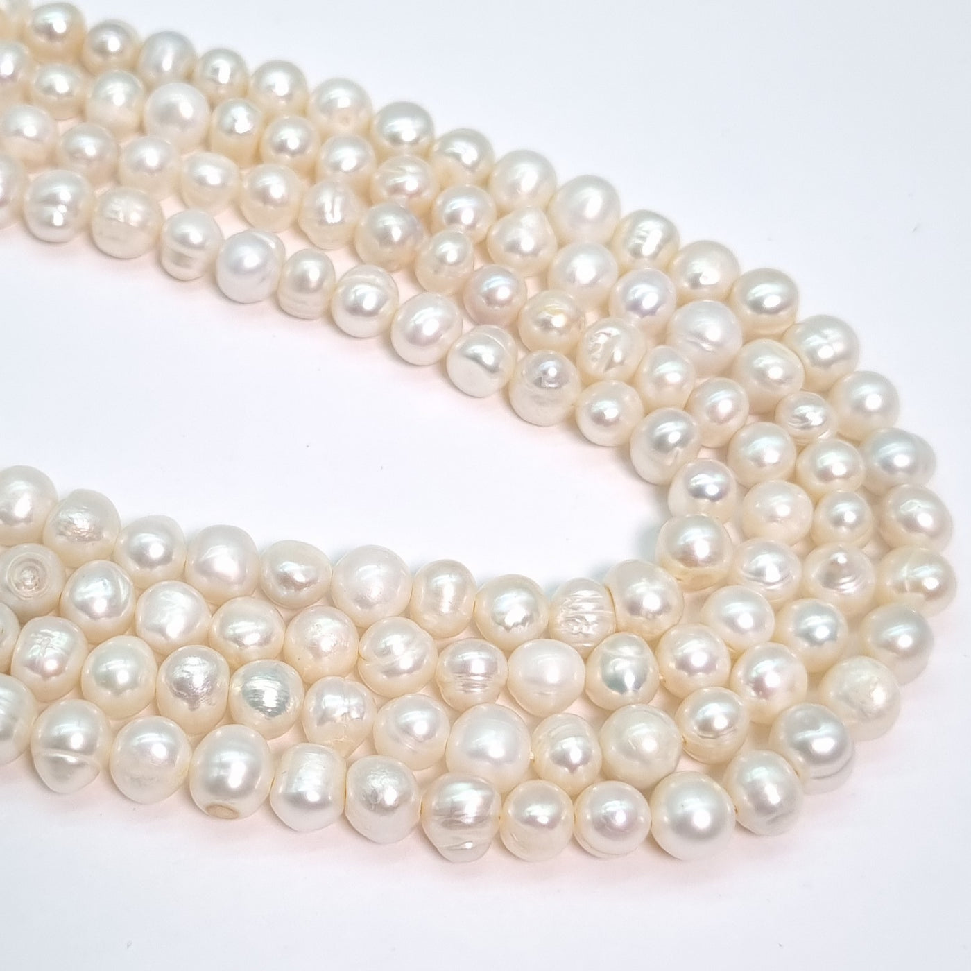 Perla Cultivada de 4-6 mm. por tira O2507