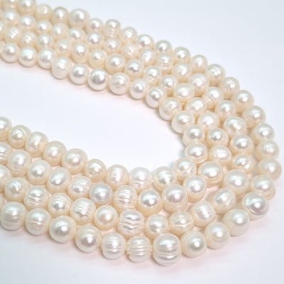 Perla Cultivada de 6-8 mm. por tira O2509